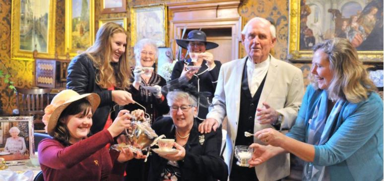 Carrying Calmly on - Guests of the Queen's High Tea enjoying themselves at Olveston Historic Home